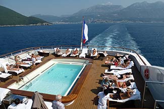 Sunbathers on L'Austral in the Bay of Kotor