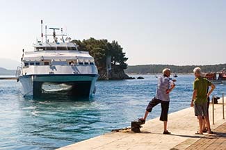 L'AUSTRAL tender and Jadrolilnija ferry in Rab, Croatia