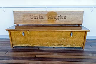 Wooden bench on Costa Magica