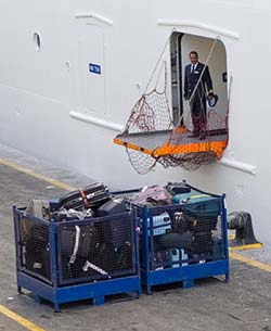Luggage being unloaded from COSTA MAGICA