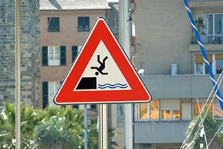Warning sign on Savona's Antica Darsena or Old Dock