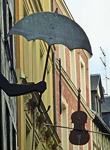 Shop facades and signs in Rouen, France