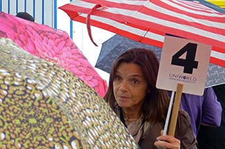 Umbrellas and tour guide in Honfleur