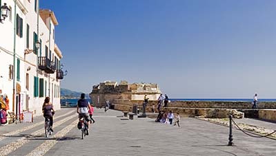 Bicyclists on Bastioni in Alghero