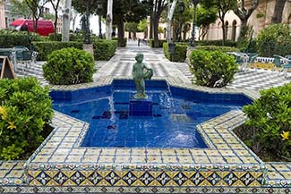 Fountain in Cadiz with cherubs and tilework