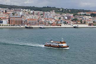 Tagus River ferry near Ponte de 25 Abril in Lisbon