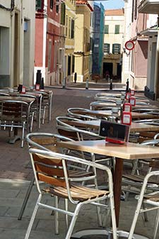 Cafe tables in downtown Maó