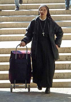 Nun with suitcase