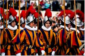 Switzerland geography history culture language travel Romansh Italian French German dialect Swiss Army American international community Swiss Guards Schyzert�tsch Allegra St. Bernard dog