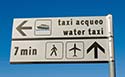 07_alilaguna_airport_water_taxi_7_minutes_sign_on_post_125_pb121915.jpg
