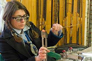 Muriel Balensi making glass beads