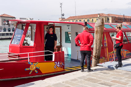 City Sightseeing Venezia water bus with crew