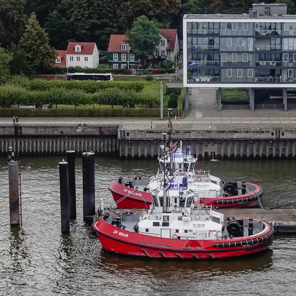 Tugboats are moored on the Elbe River near Hamburg.