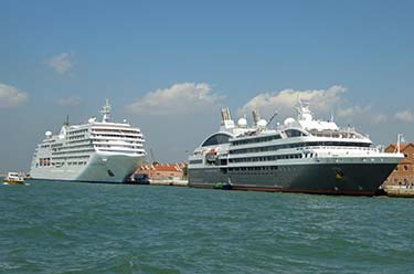 L'Austral and Silver Spirit at San Basilio pier, Venice, italy