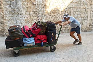 Porter with luggage in Dubrovnik
