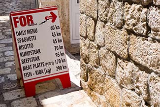 Restaurant sign in Hvar