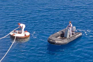 Mooring buoy and Zodiac in Pomena, Mljet, Croatia