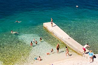 Beach below St. John the Evangelist in Rab, Croatia