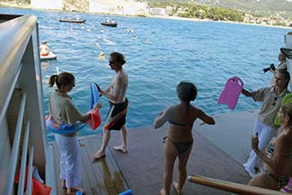 Passengers on L'Austral's marina