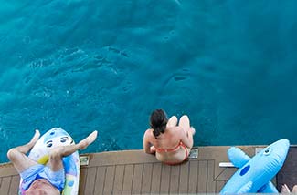 Bathers on L'AUSTRAL's marina