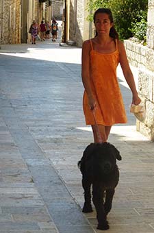 Woman and dog in Rab, Croatia