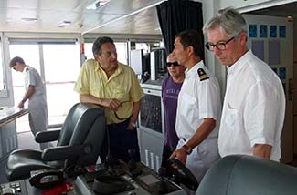 Passengers talking to the captain on L'Austral