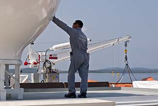 Crew member with satellite dome