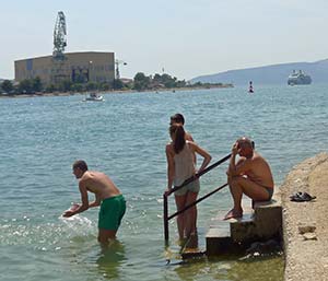 Swimmers in Trogir harbor
