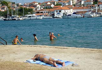 Swimmers in Trogir Harbor