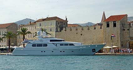Trogir city walls and yacht