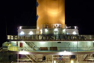 Costa Magica funnel at night