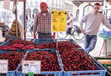 Fruit vendor at Hauptmarkt in Trier, Germany