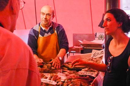 Paola Salvati and fishmonger in Chioggia