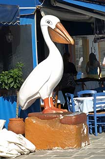 Katakolon fish restaurant with pelican statue