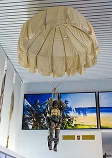 Paratrooper exhibit at D-Day Museum, Arromanches