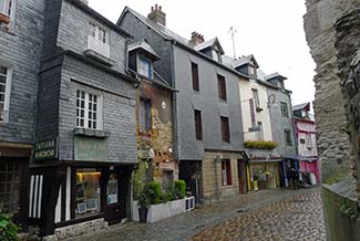 Slate-shingled building façades in Honfleur