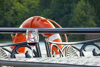 Life preserver and glass of wine on the Seine