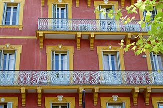 Building with wrought-iron balconies in Ajaccio