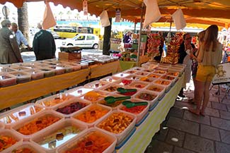 Candy vendor in Ajaccio, Corsica public market