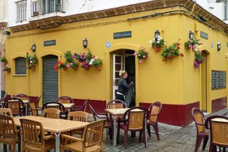 Cadiz restaurant with hanging flowerpots