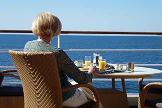 Lady having breakfast at La Terrazza