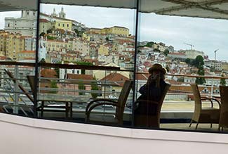 Lisbon reflected in La Terrazza windows on Silver Spirit