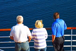 Passengers at rail on SILVER SPIRIT in Port Mahon