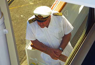 Captain of Silver Spirit on bridge