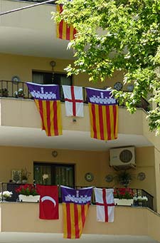 Flags on buildings in Soller, Spain