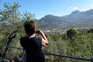 Tourist taking photo on Palma-Soller railroad lilne