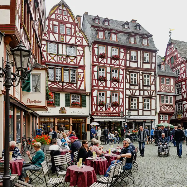 Visitors congregate in the main square of Bernkastel-Kues, Germany.