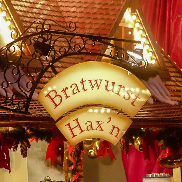 A food stand advertises its wares at a German Christmas market.