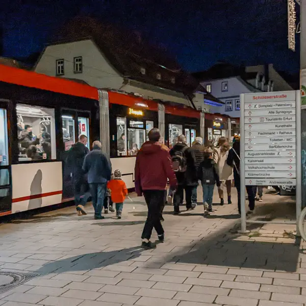 Passengers board a tram in Erfurt, Germany.