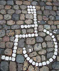 wheelchair icon in cobblestone pavement, Freiburg im Breisgau, Germany